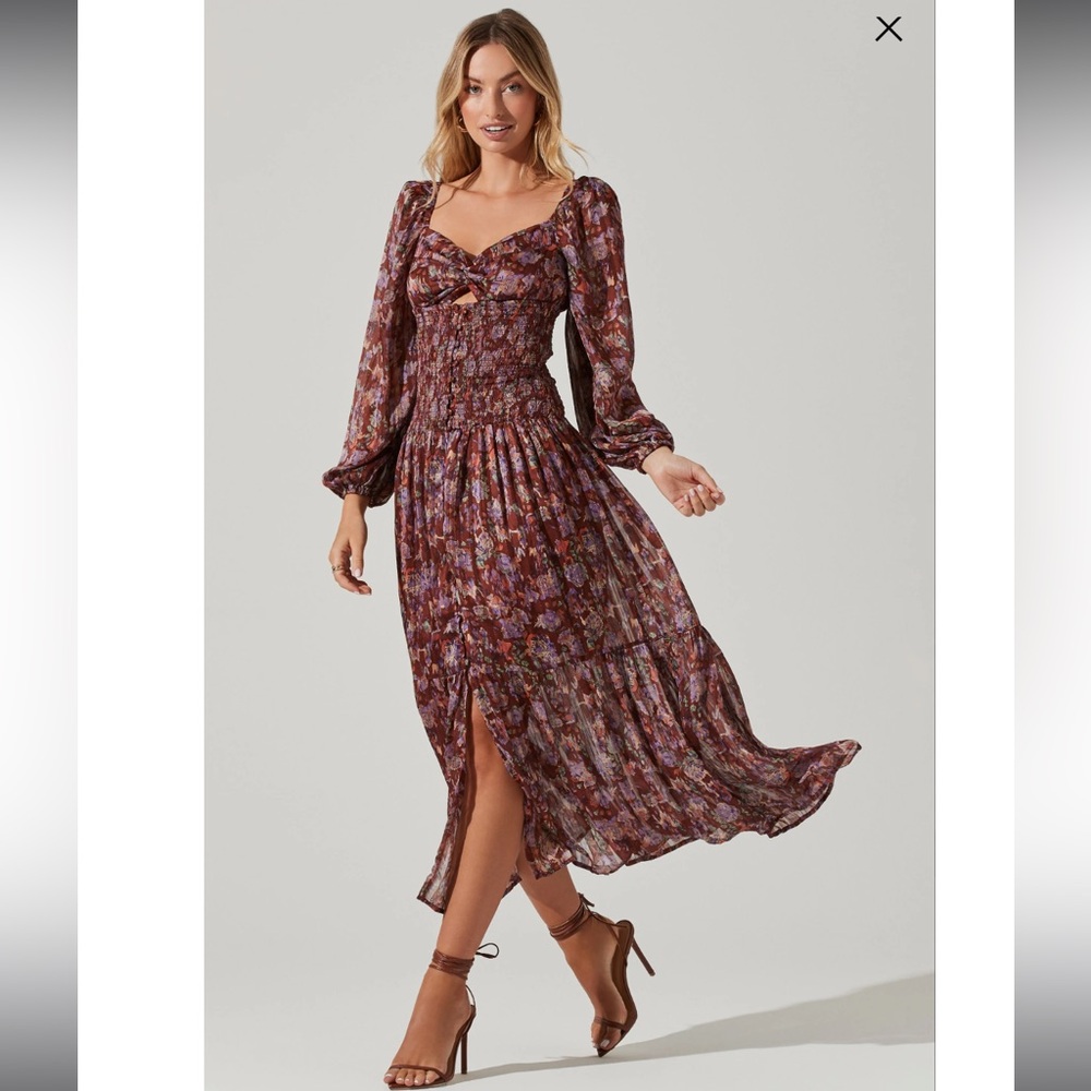 Astr floral long sleeve dress with smocking Size M. Wore once fit family photos.